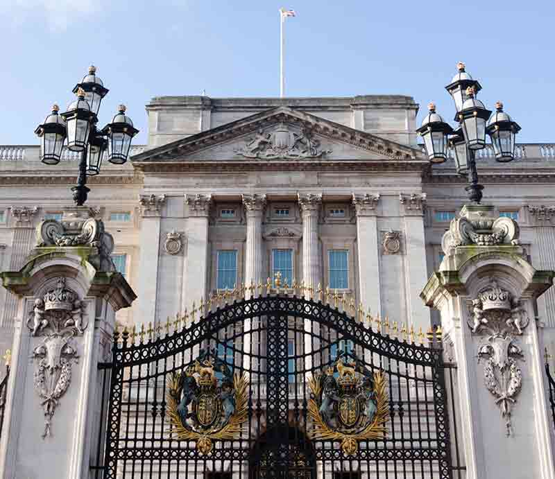 Facade with columns and ornate main gates.