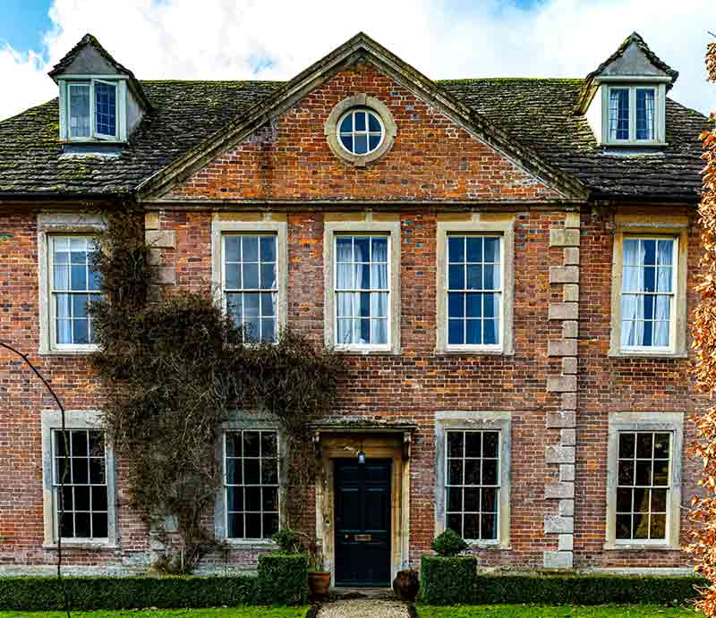 Beautiful brick exterior with climbing ivy.