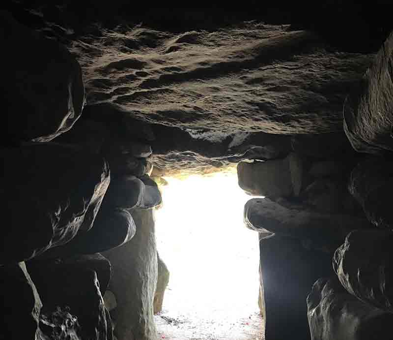 Looking out from the tomb into daylight.